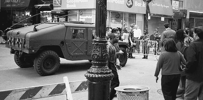 Photo: Humvee, National Guard, pedestrians