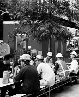 Photo: Clean-up crew eating lunch at a McDonald's booth